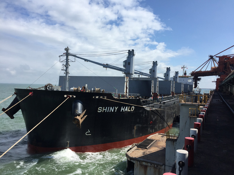 Open bunker waiting for the cargo ship to load coke